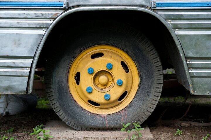 this 1968 ford bus conversion was done using recycled materials, Old bus wheel