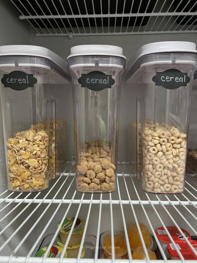 why i love to decant pantry itemsif typeof ez ad units undefined, Three Oxo containers storing cereal in a pantry I love