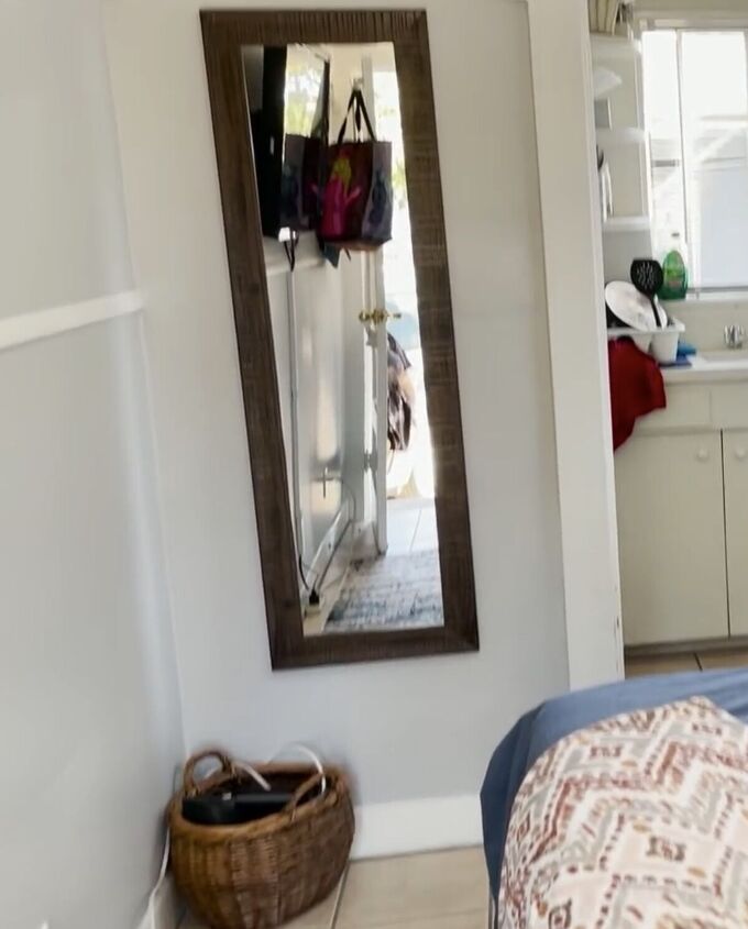 how to do a cute studio apartment makeover in a 100sqft space, Installing a mirror