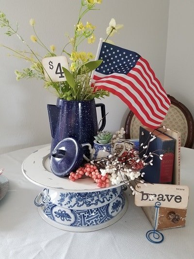 the best ways to use books in your decorating, Patriotic centerpiece showing recreated vintage cash register flags
