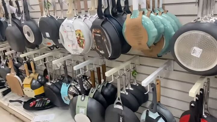 tj maxx and marshalls 10 shopping secrets only the employees know, Pans hanging on racks in store