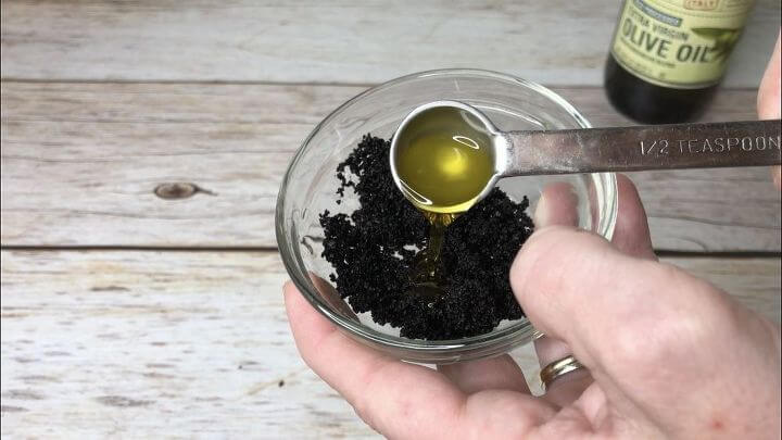 how to use ground coffee with these 10 amazing and easy hacks, Mix 1 2 teaspoon olive oil or oil of your choice with coffee grounds