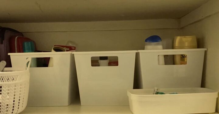 coupon stockpile organization how to organize your linen closet, Organized bins in a closet