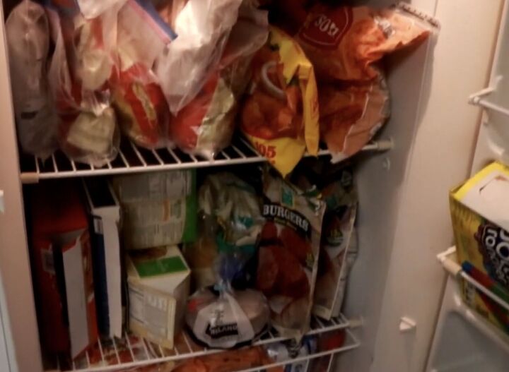 clutter control 10 things you re buying way too much of, Overflowing freezer
