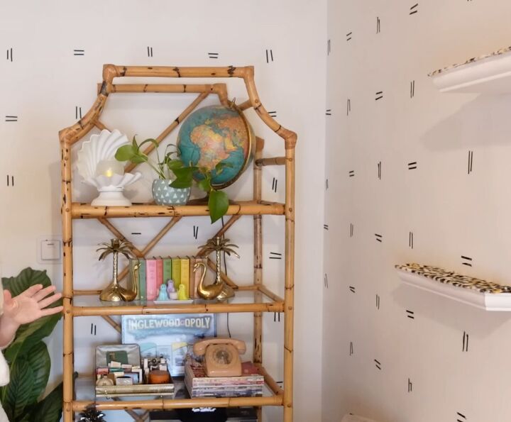 maximalist apartment tour creative diy projects fun thrifted items, Hollywood Regency pagoda style rattan shelf
