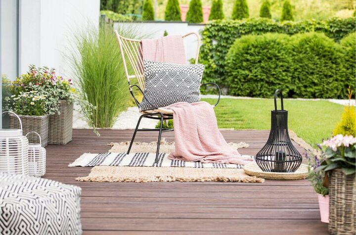 low budget porch decor a guide to affordable outdoor makeovers, Rugs blankets and throw pillows in all colors and sizes get you closer to your home s personal style outside