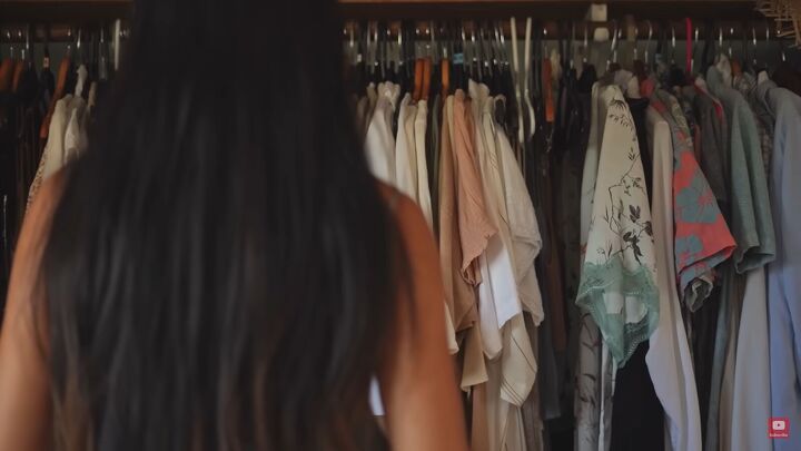 how to be ruthless when decluttering clothes, Going through clothes in a wardrobe