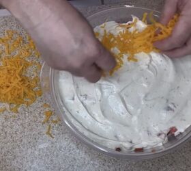 easy summer side dishes, Sprinkling cheese on top of the ranch dressing