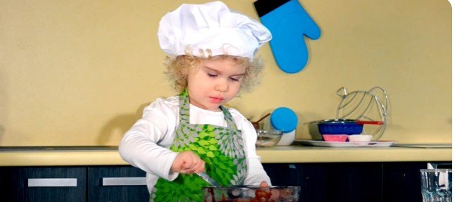 Child wearing apron