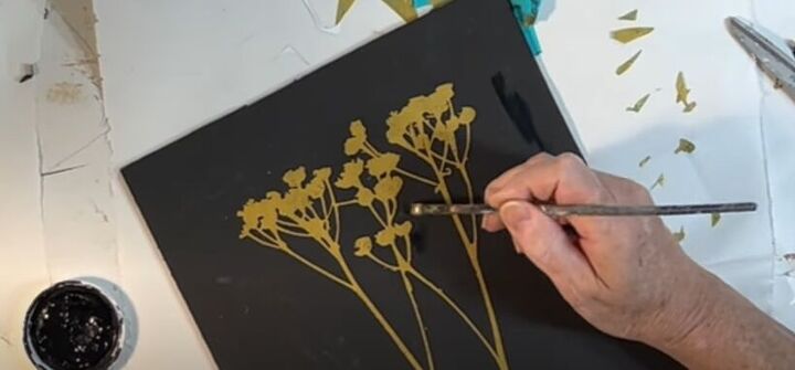 how to update home decor, Creating black and gold wall art