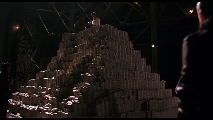 what does the bible say about money, Sitting on mountain of coins