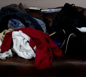 Laundry piled on sofa