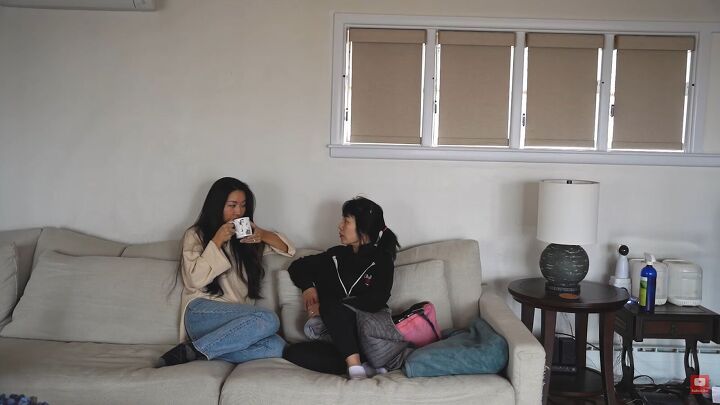 Drinking tea on sofa and talking