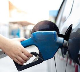 fighting inflation 3 ways to save money and stay positive, Filling car up with gas