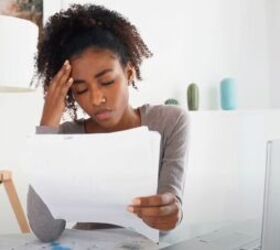 8 life changing benefits of being frugal, Woman stressing over bills