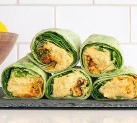 frugal meals that are also healthy delicious, Hummus wraps with a bowl of fruit in the background