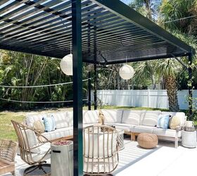 31 easy ideas to decorate a patio or porch for summer, outdoor sectional with swivel chairs all with rattan and blue and white pillow