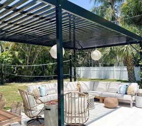 31 easy ideas to decorate a patio or porch for summer, gorgeous black pergola styled with beautiful outdoor decor