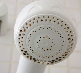 8 surprising things you can use wd 40 for in the bathroom, Mildewed showerhead