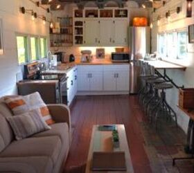 Take a tour of this seriously cool WWII train car tiny home